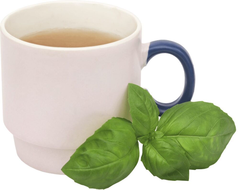 mug of basil tea with basil leaves